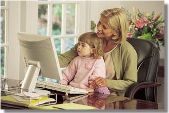 Online Business Consulting Services: Woman with her child enjoying computer-work.