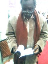 home-biz-trends.com/phoenix-order.html - Phoenix Order: Friend Attif Ismael reading Rising of the Phoenix by poet journalist Khalid Mohammed Osman in Cairo Book Fair 2010.